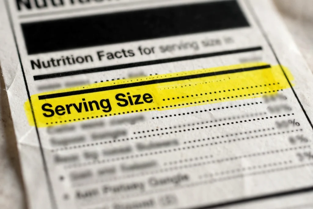Close-up of a nutrition facts panel highlighting serving size